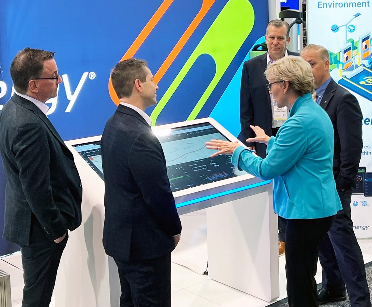 Former Governor of Michigan, Jennifer Granholm viewing a kiosk that demonstrates Future Energy's software