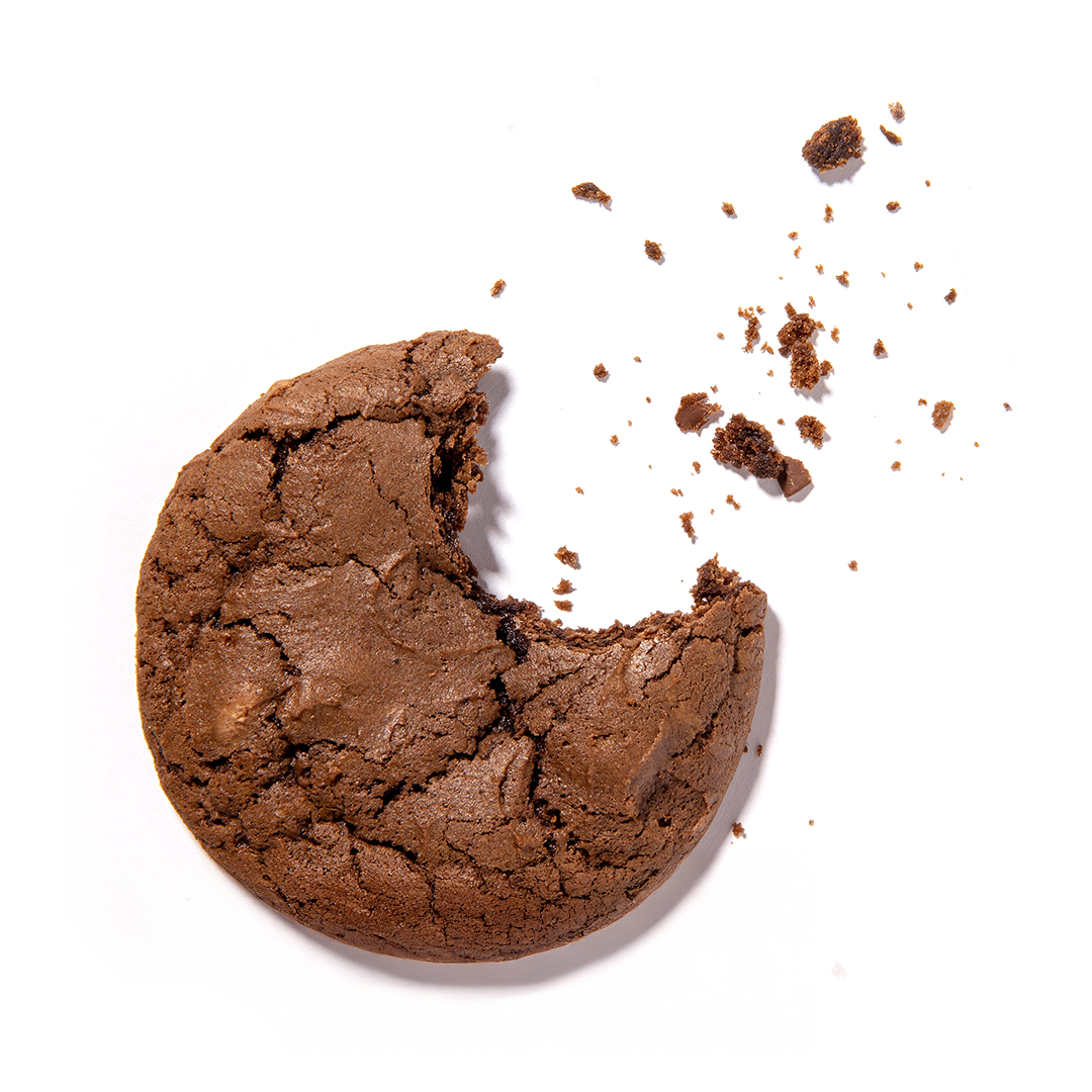 An image of a chocolate cookie with a bite taken.