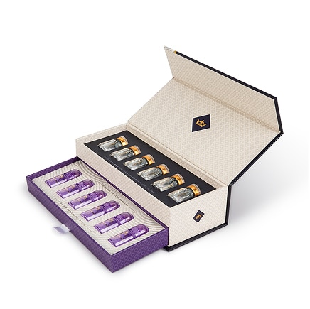 Platinum Skin Care Alqemi box opened to show the series of vials included with the product