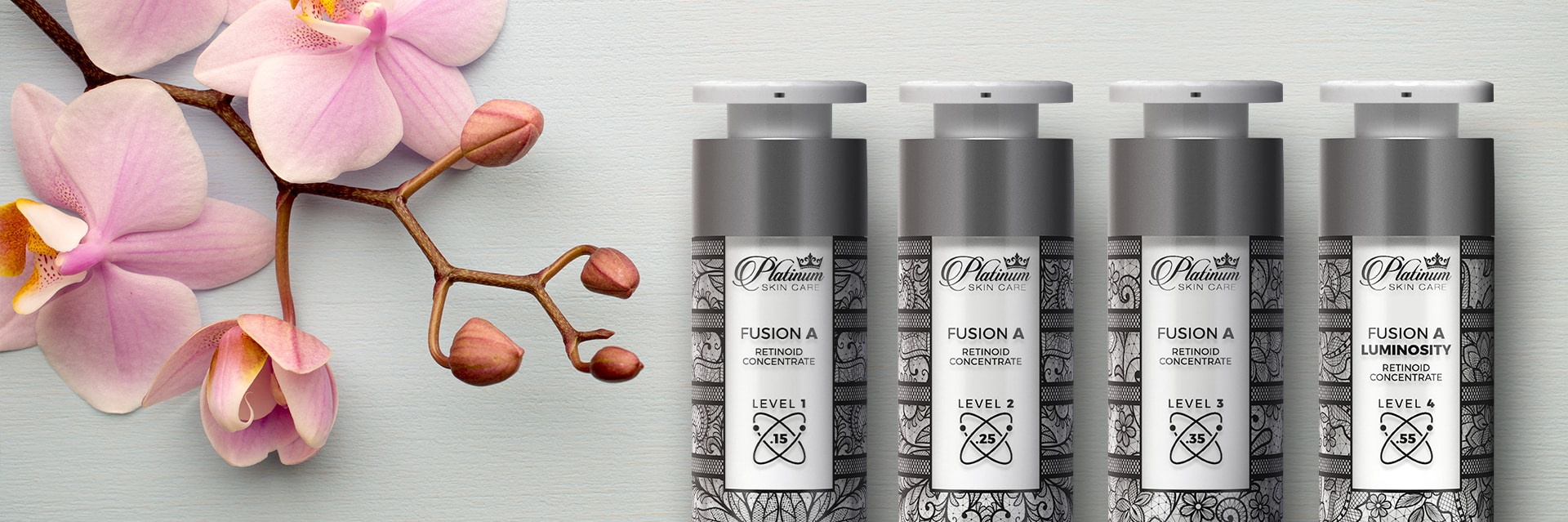 Image of Platinum Skin Care Fusion A bottles with orchids